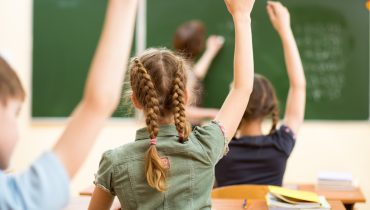 School children in classroom at lesson